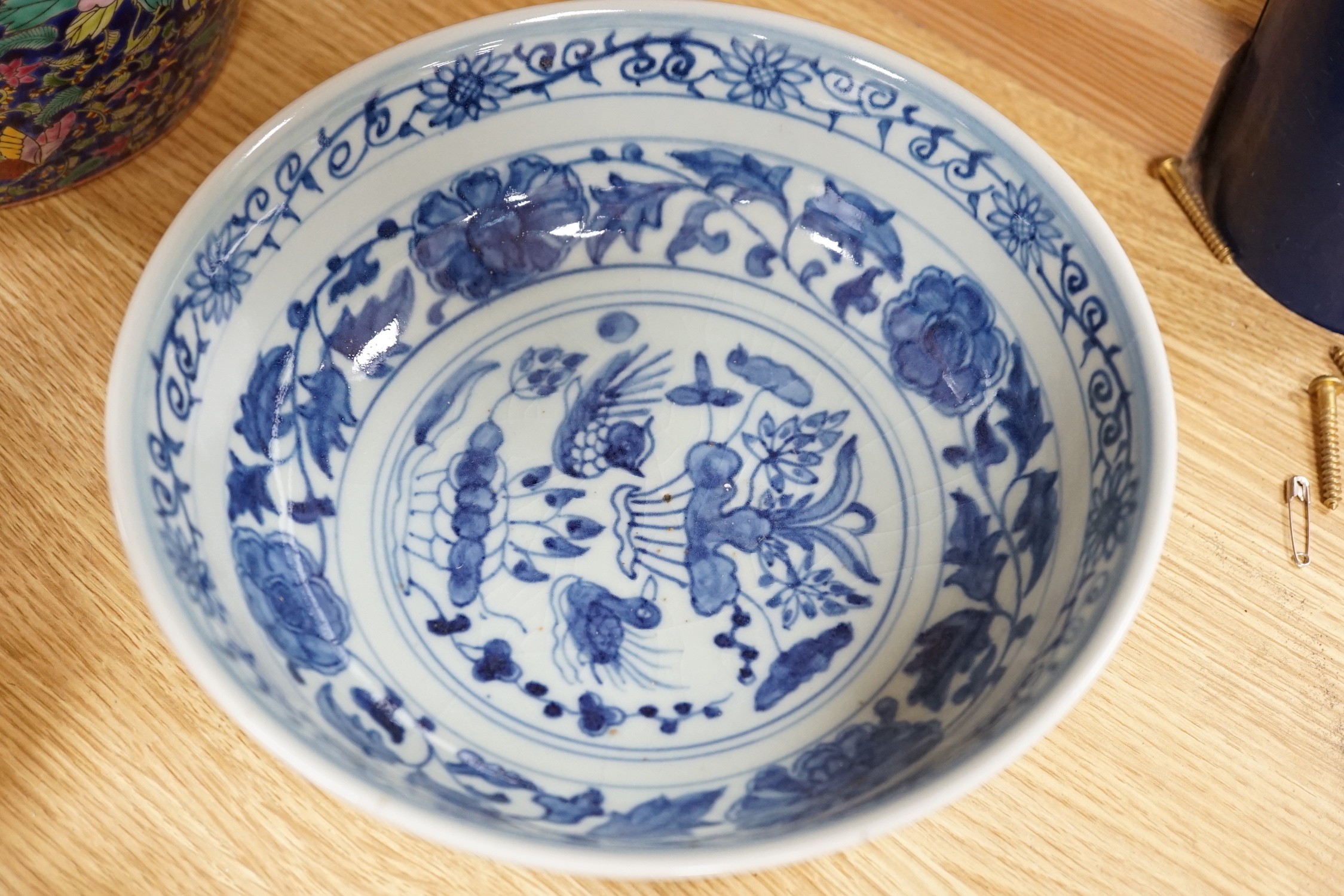 A group of various Chinese ceramics, to include a blue and white prunus jar, an earthenware dish, a famille rose jar and cover and others